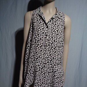 Cari white on black floral button down top in size small with flare bottom.